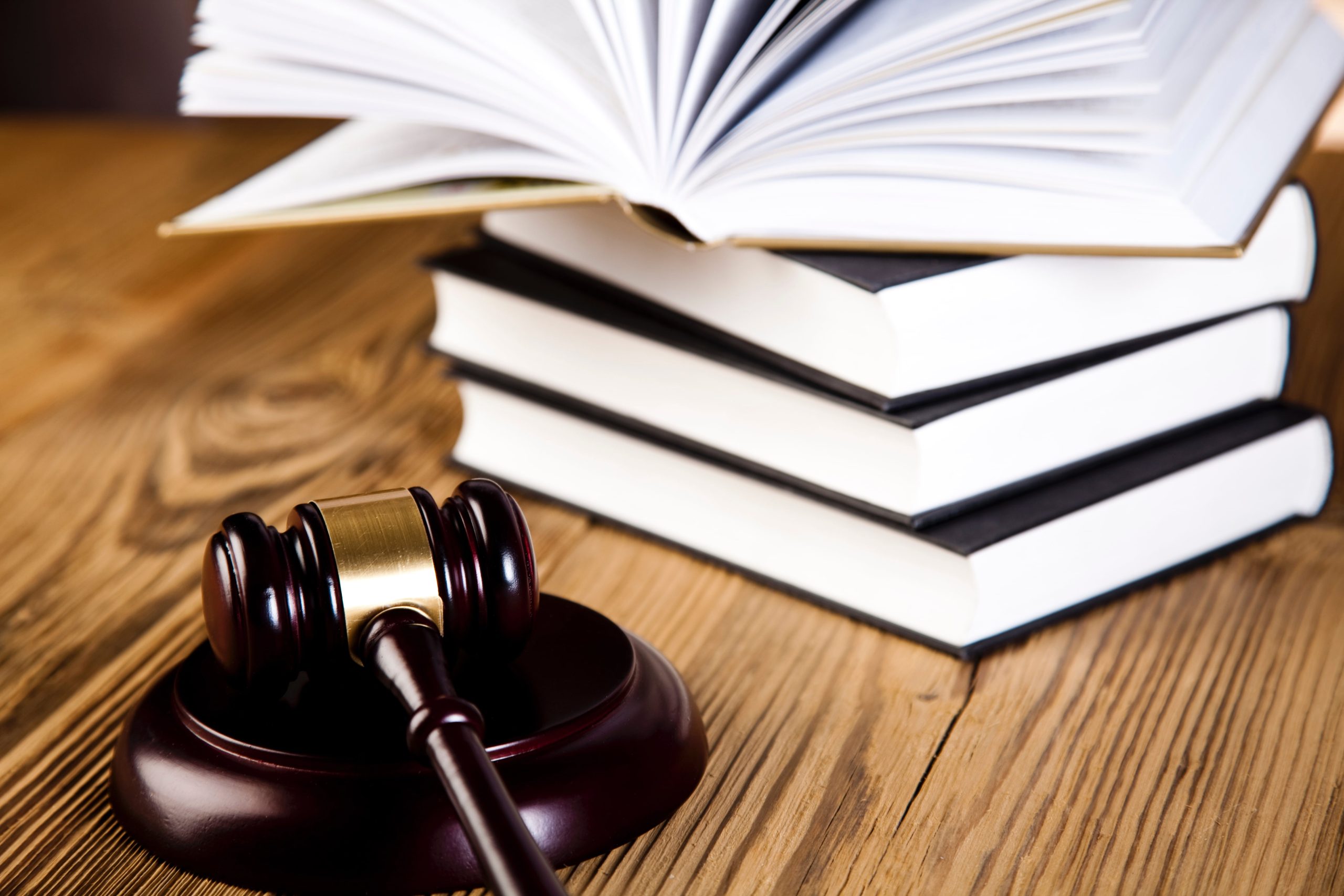 Image of a stack of legal books that a civil litigation attorney would use.