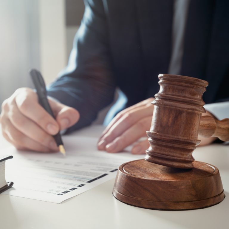 Attorney, clerk, bookkeeper working in the office. Signing contract or agreement concept