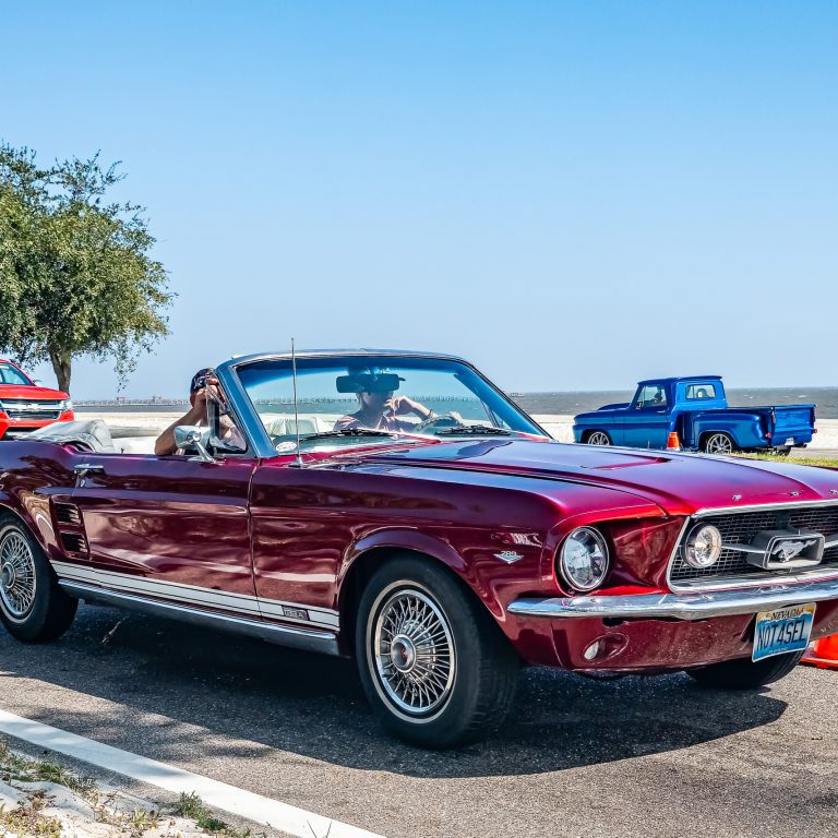 Gulfport, MS - October 03, 2023: High perspective front corner view of a 1967 Ford Mustang GTA Convertible at a local car show.